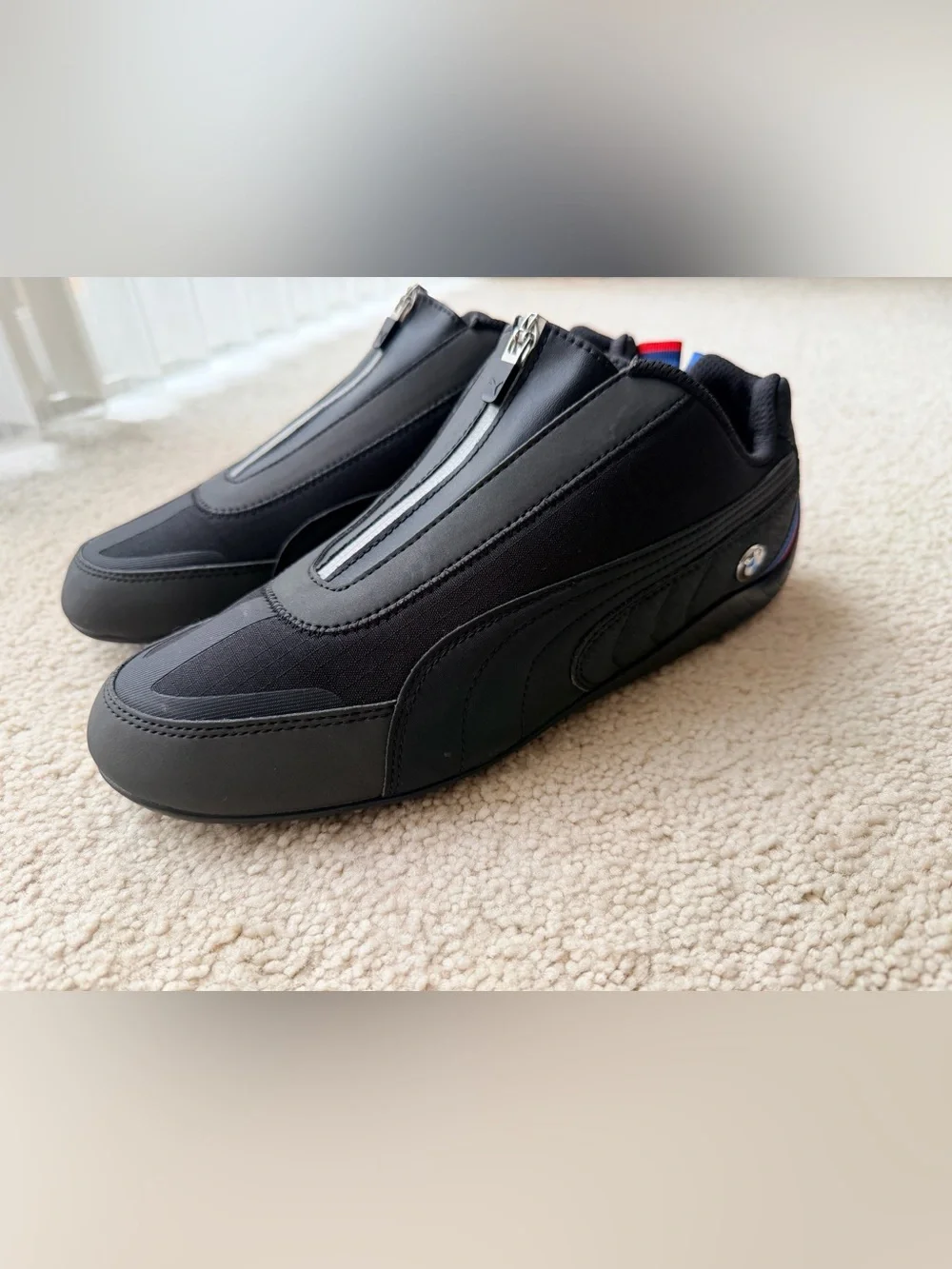Puma Black low-profile Sneakers with Red & Blue Heel Accents